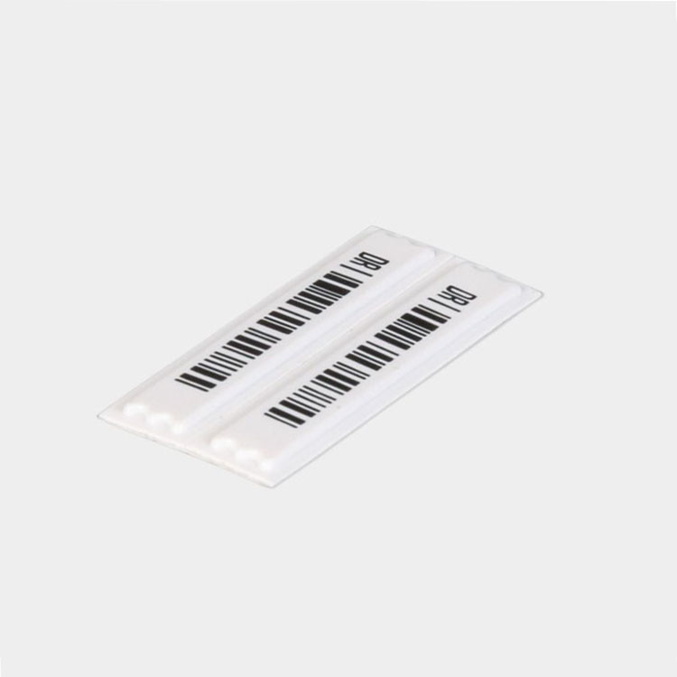 Quality Black AM Label Barcode Labeling , Double-sided Kraft Liner 0.12mm Thick for sale