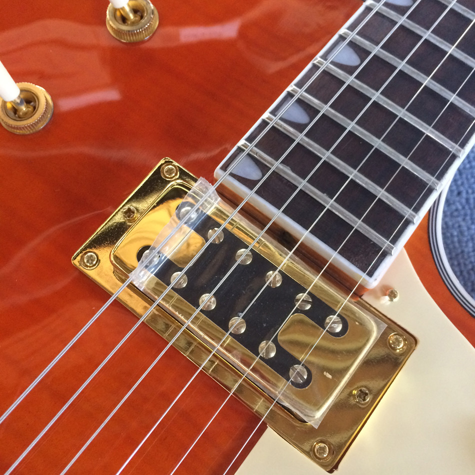 New style high-quality hollow body jazz electric guitar, Double F holes,Tremolo system ,Flame Maple top