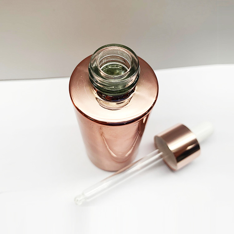 OEM ODM Rose Gold Electroplating Glass Dropper Bottles Round Shape