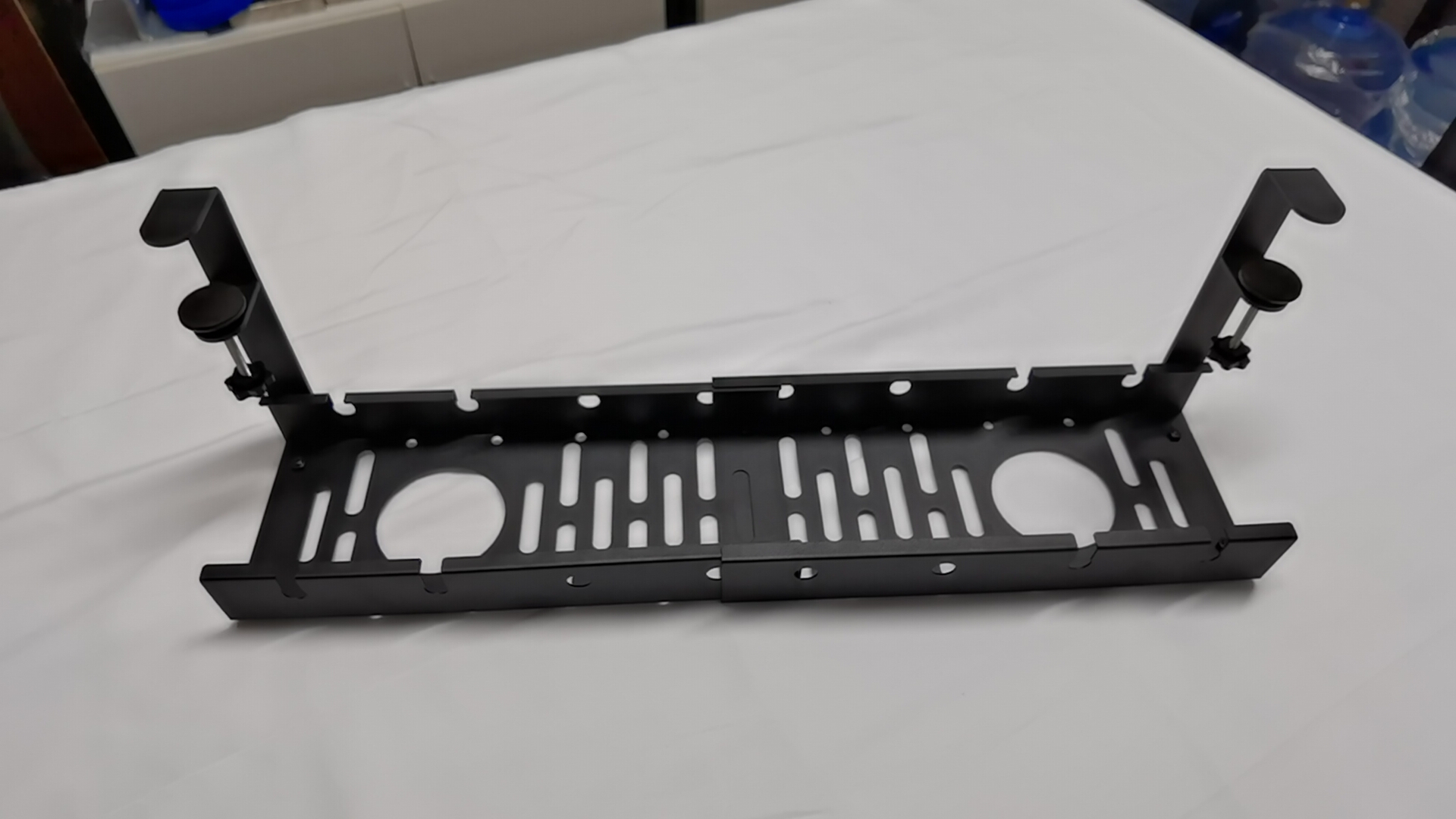 Innovative Under-Desk Cable Management Rack for Organized Wire Management in Offices