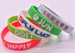 China Hand Strap Luminous Silicone bracelet Recessed wrist Rubber strap custom OEM logo words color size wrist on sale