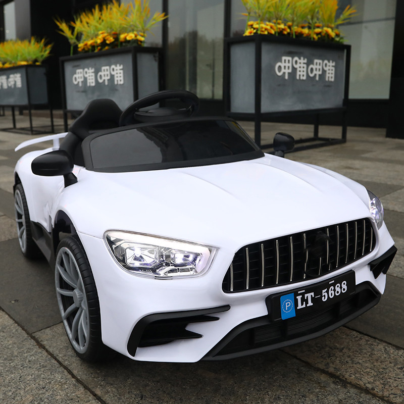 380*2 Motor 2.4g RC Electric Car Opening Door and 4 WHEELS Ride On for Kids aged 2-10 Years