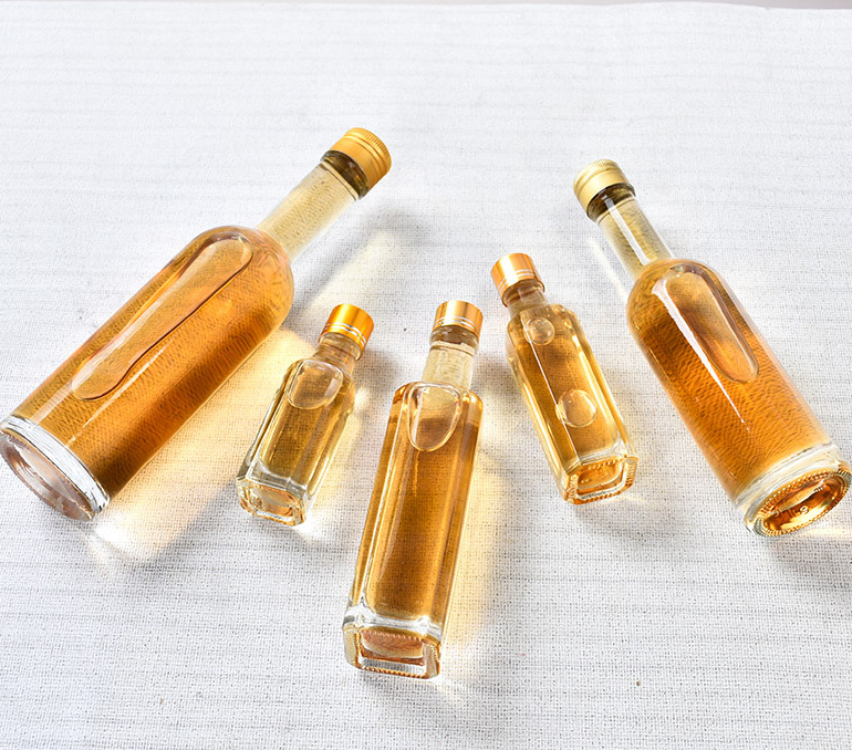 Glass Olive Oil Bottle 100ml 250ml 500ml Round Clear Cooking Oil Bottle with Cap