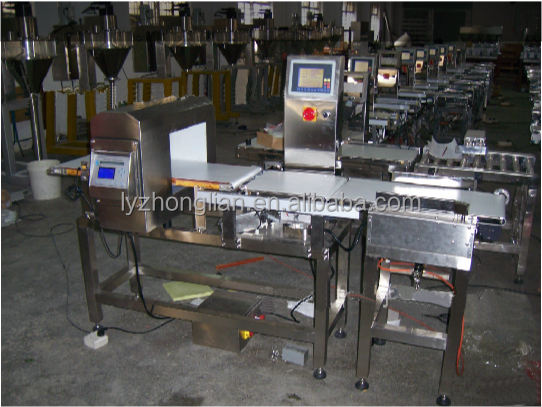 State-of-the-Art Metal Detector for Food Detection Industry Facing the Display Screen