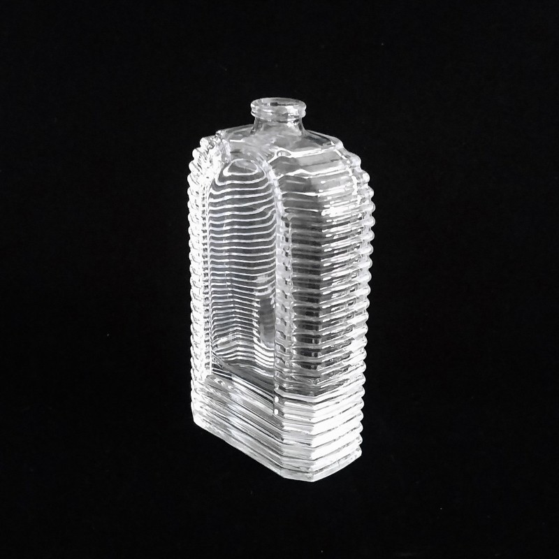 High Grade 60ml Carved Shaped Glass Perfume Bottle With Thick Bottom Made Of Crystal White Material