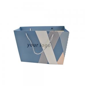 Quality Craft Paper Small Blue Custom Paper Shopping Bags With Ribbon for sale