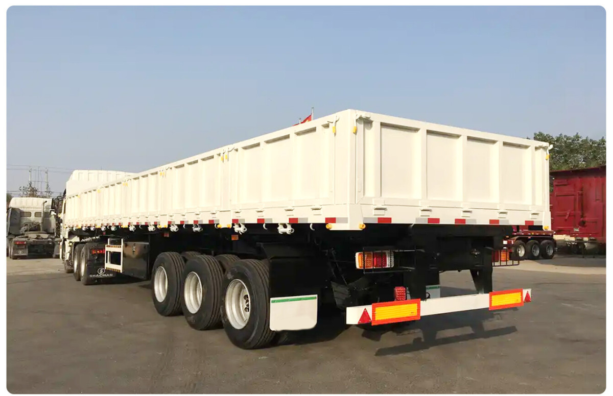 CIMC Tri axle Side Tipper 70 Tons allows goods to be unloaded from the side transporting building materials dump semi trailer