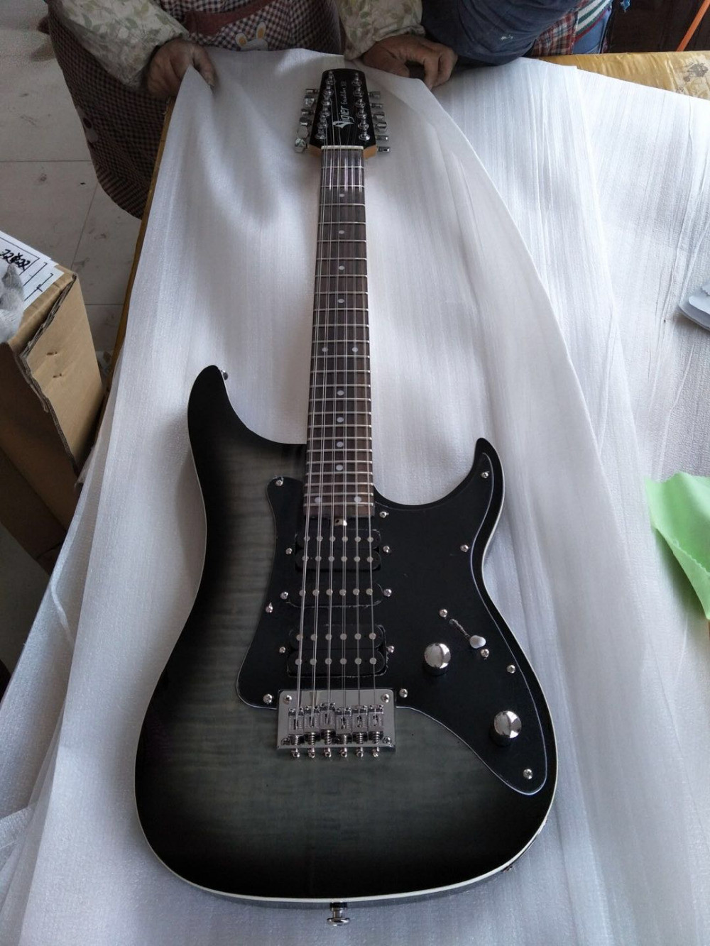 New arrival 6 string electric guitar with silvery bridge and cool shape