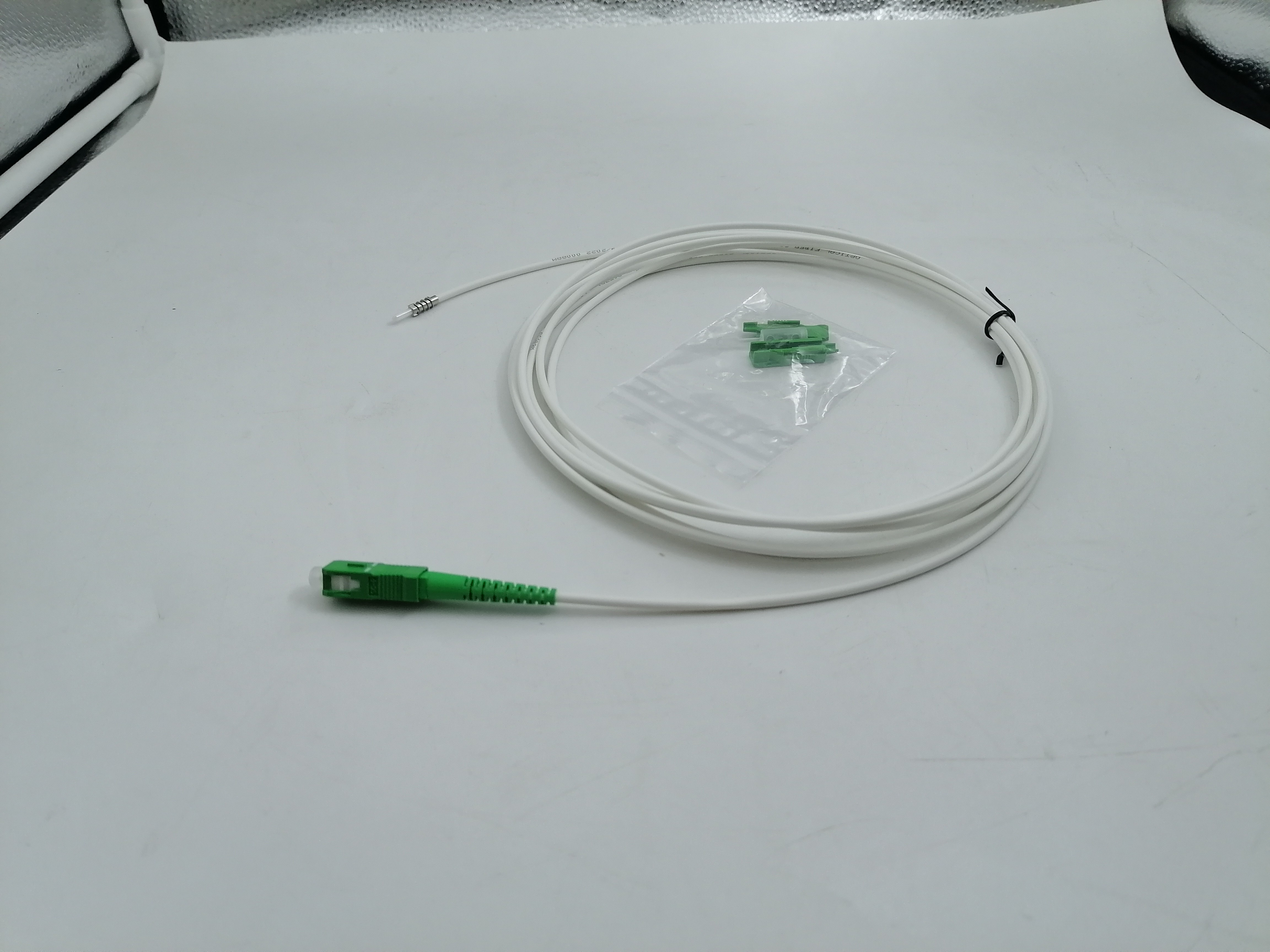 Flexible SC APC Ferrule To SC APC Armored Fiber Patch Cable G657A2 3.0mm UV White 30m 50m