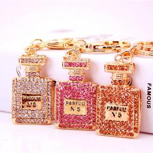 Quality Perfume Bottle Key Chain Ornaments Diamond Studded Irregular Shape for sale