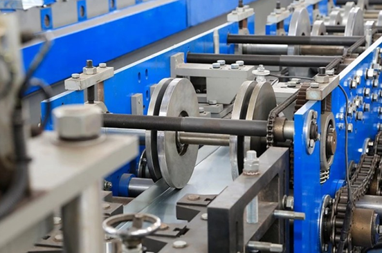 Stud and track rolling machine