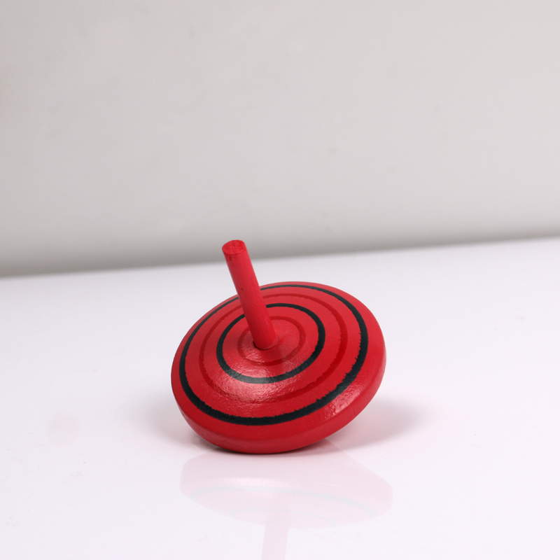 colorful wooden spinning top for child