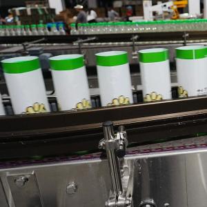 Automatic Sleeve Labeling Machine 9000-72000bph for Bottles Cans