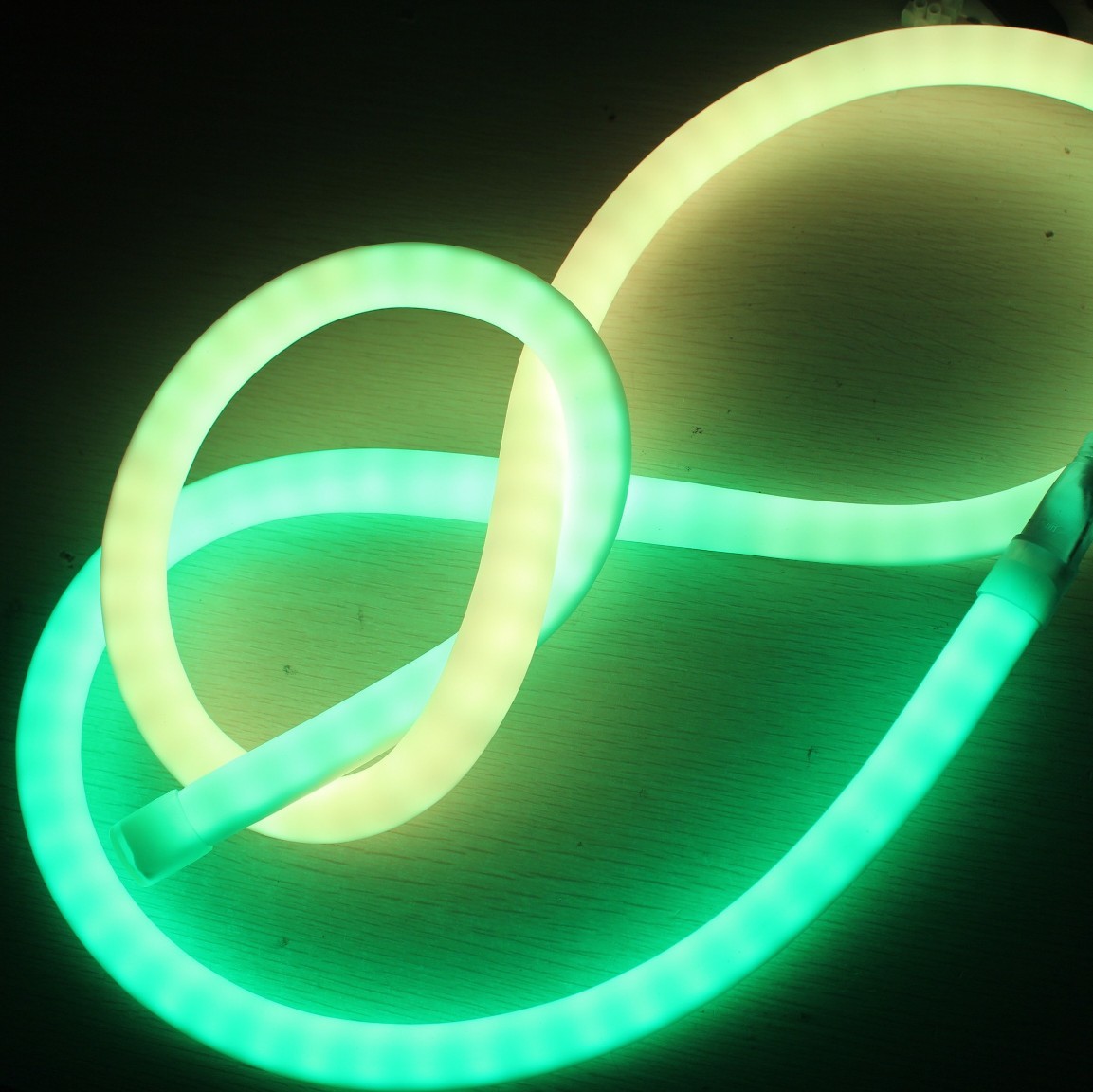 Quality 24v pretty pixel chasing led neon rgb 360 degree soft ribbon tube silicone material for sale
