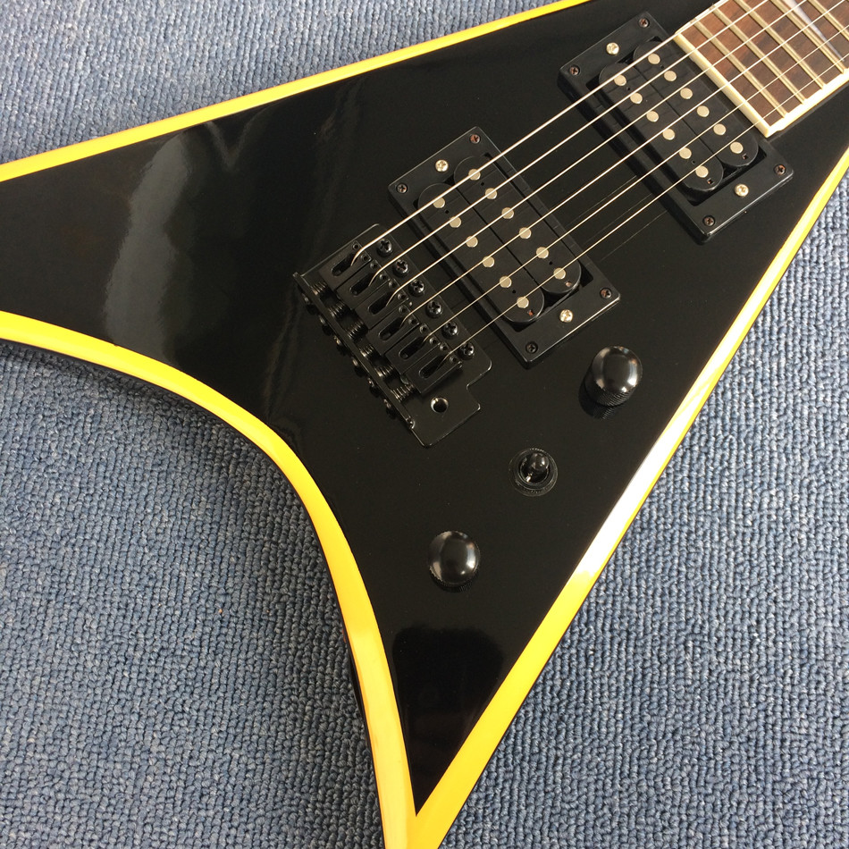 New high quality V type electric guitar,Rosewood, yellow circle black edge