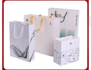 China 128gsm-350gsm Art Paper Shopping Bag Simple Strokes Printing Brown Paper Grocery Bags on sale