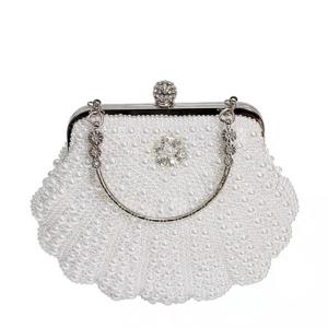 Buy cheap White Shell Shape Pearl Hand Bags Hand Woven For Women 22cm length 18cm height from wholesalers