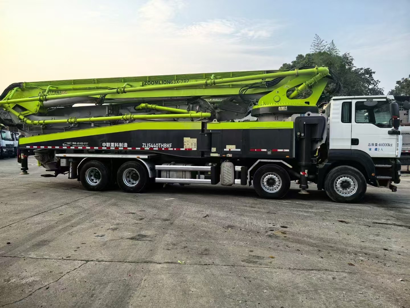 Zoomlion ZLJ5440THBKF 63m 2020 Sitrak Chassis White And Green Used Concrete Pump Truck In Good Condition