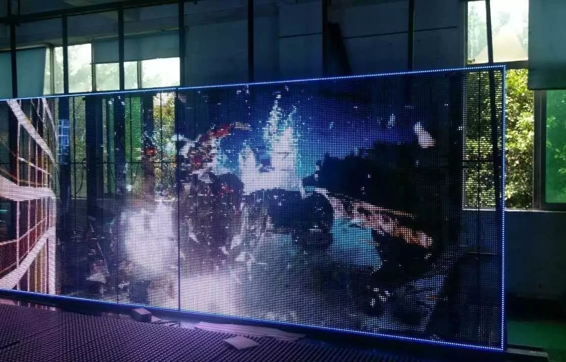 Consumption Saving and High Brightness Transparent LED Display for Outdoor Environments