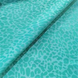 China 100gsm 65d Women Suit Fabric Sea Island Leopard Print Satin Fabric on sale