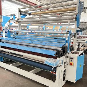 China Horizontal Fabric Inspection Machine Textile Rolling And Cutting Machine on sale
