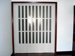 Quality Interior Decorative PVC Accordion Folding Door Walnut Color With Glass for sale