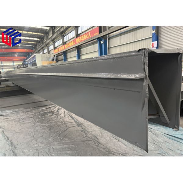 Heavy duty steel structure with green finish showing column and beam assembly