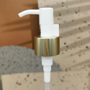 Quality 24/410 Long Nozzle Plastic Cosmetic Lotion Pump Gold Aluminum Closure Metal Shell With Clip for sale